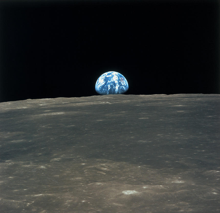 Planet Earth Viewed From The Moon #1 Photograph by Stockbyte