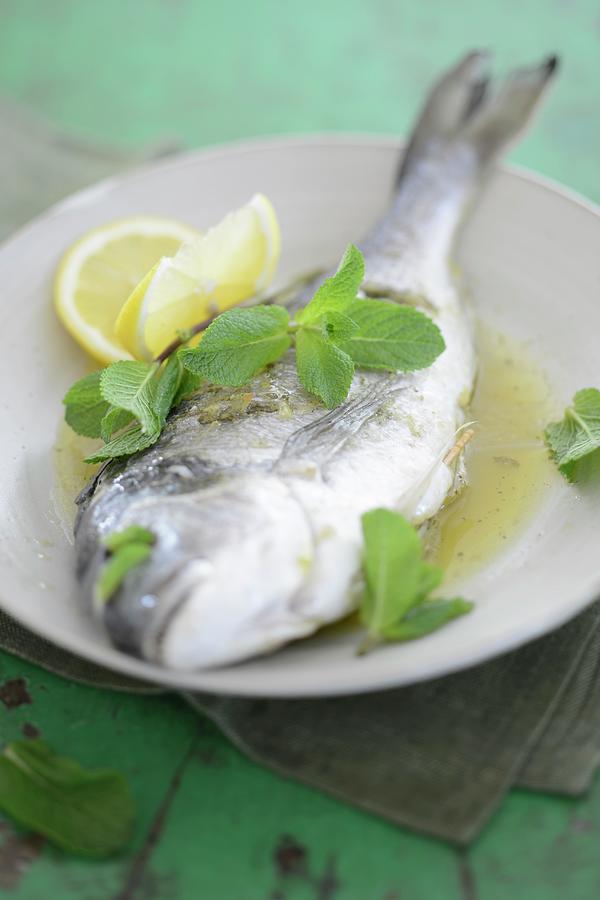 Poached Dorade With Lemon And Mint #1 Photograph by Tanja Major