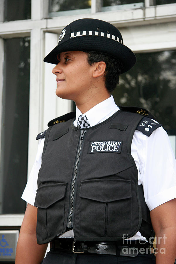 Policewoman Wearing Body Armour #1 Photograph by Cordelia Molloy/science Photo Library