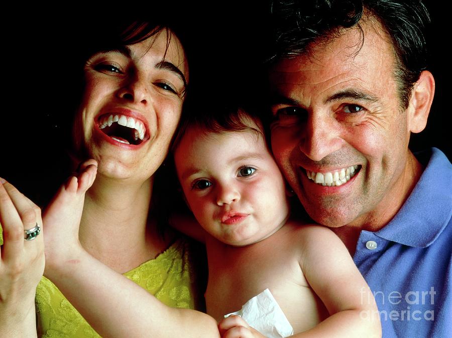 Portrait Of Proud Parents With Their Baby #1 Photograph by Oscar Burriel/science Photo Library