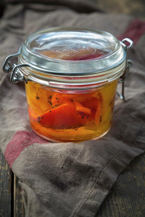 Preserved Peperoni Grigliati chargrilled Peppers, Italy On A Wooden Table #1 Photograph by Larissa Veronesi