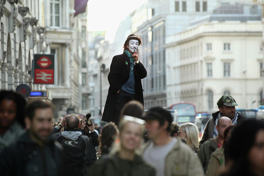 Protestors From Occupy London Celebrate #1 Photograph by Oli Scarff