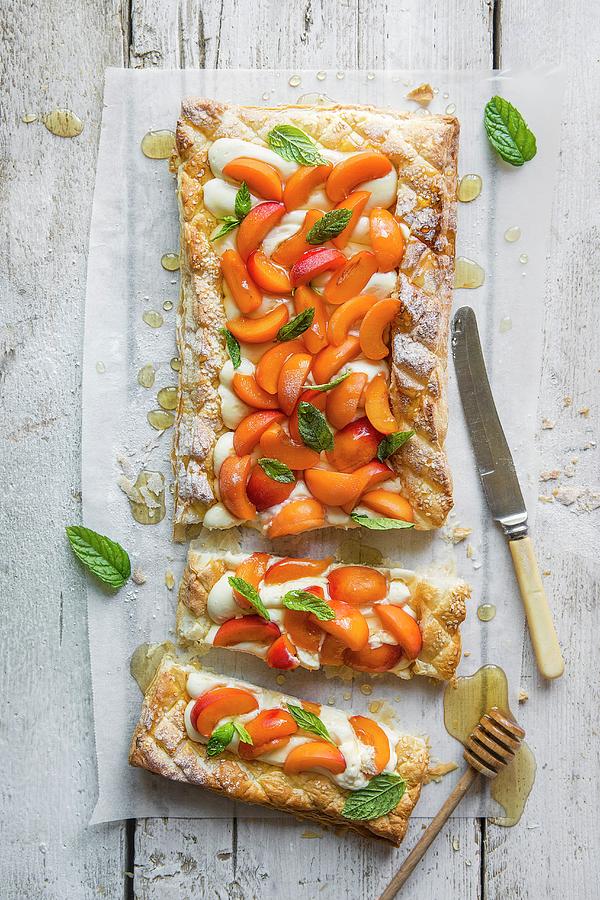 Puff Pastry Tart With Vanilla Creame Cheese, Fresh Apricots And Honey #1 Photograph by Magdalena Hendey