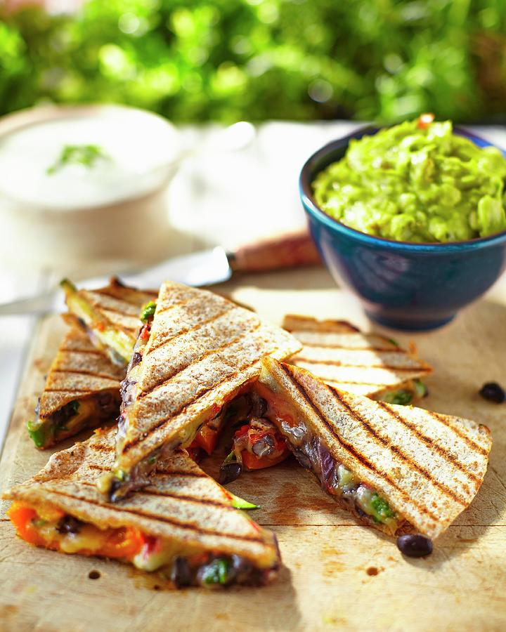Quesadillas With Oven-roasted Vegetables, Guacamole And Sour Cream mexico #1 Photograph by Tom Regester