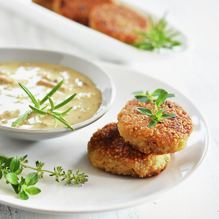 Quinoa Cakes With A Herb And Mushroom Sauce #1 Photograph by Mariola Streim