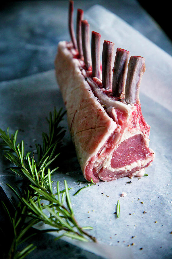 Rack Of Lamb On Greeseproof With Rosemary Pre Cook #1 Photograph by Karen Thomas