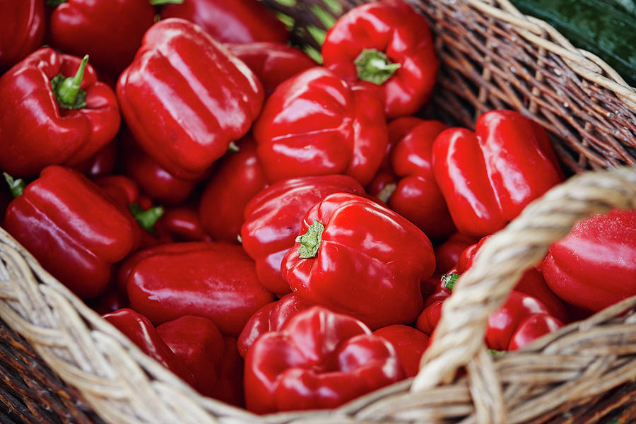 Red Peppers In A Basket On A Market Stall #1 Photograph by Dominik Paunetto