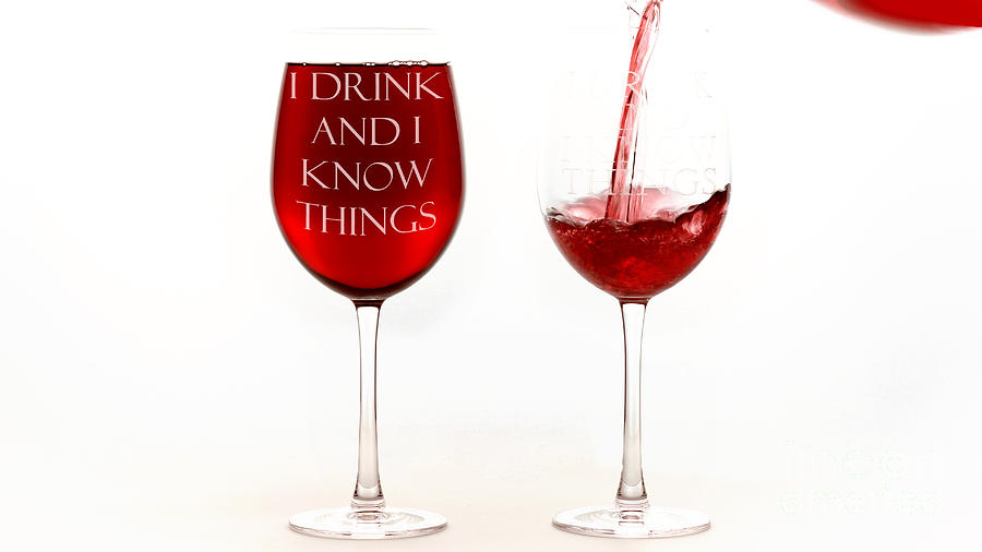 Red wine glasses with I drink and I know things text. #1 Photograph by Milleflore Images