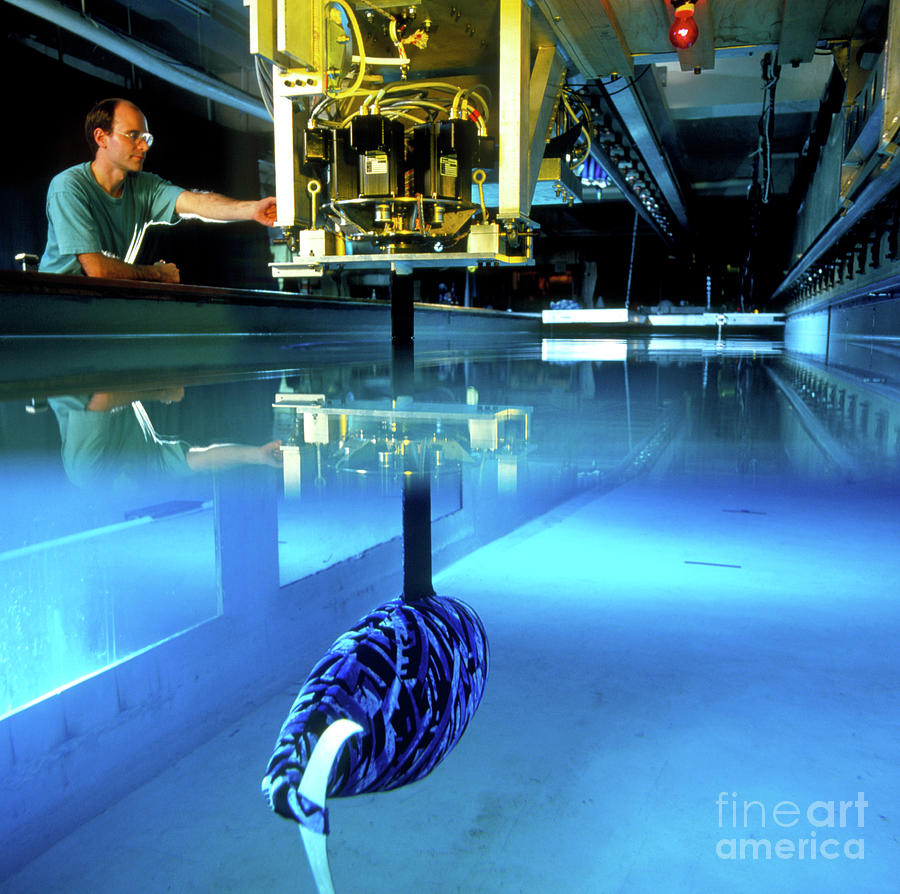 Researcher With A Robotic Fish #1 Photograph by Sam Ogden/science Photo Library