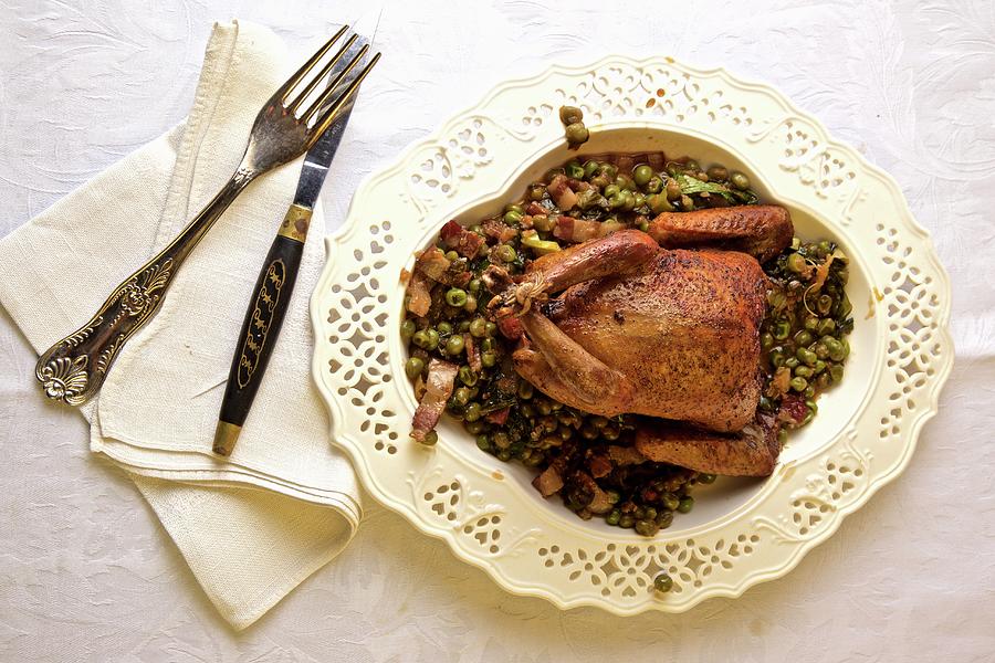 Roast Pigeon On A Bed Of Braised Peas #1 Photograph by Andre Baranowski
