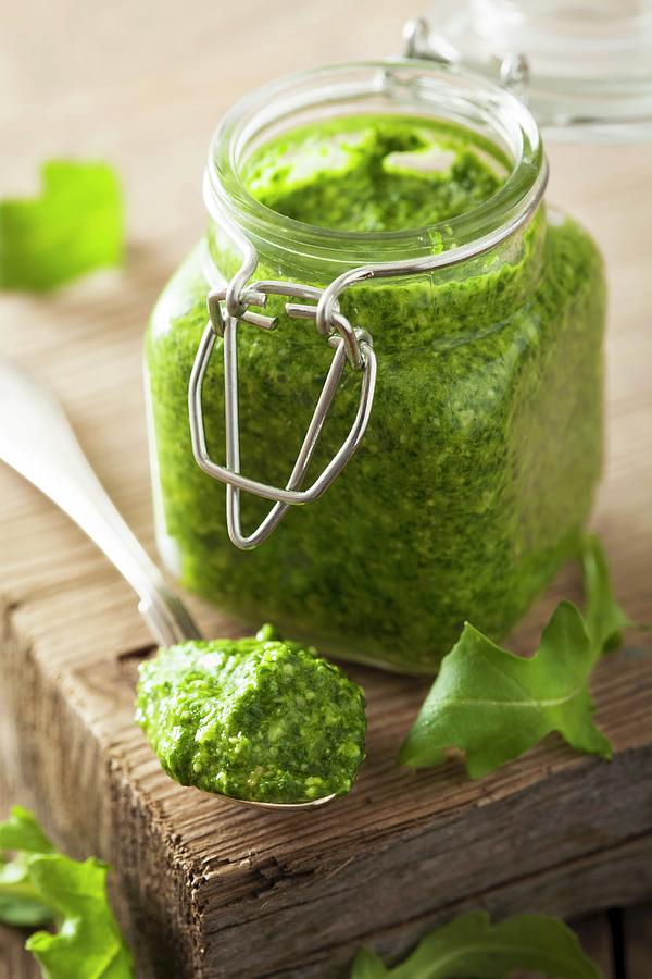 Rocket Pesto In A Jar And On A Spoon #1 Photograph by Olga Miltsova
