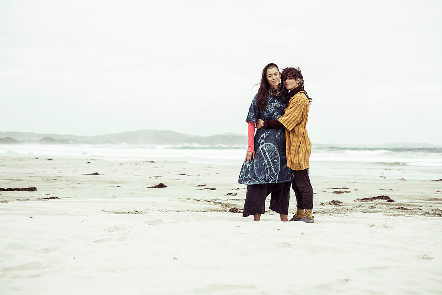 Beach Lesbian Sex Gallery - Same Sex Lesbian Couple Hug On Wild Remote Beach Adventure In The Wind  Photograph by Cavan Images - Fine Art America