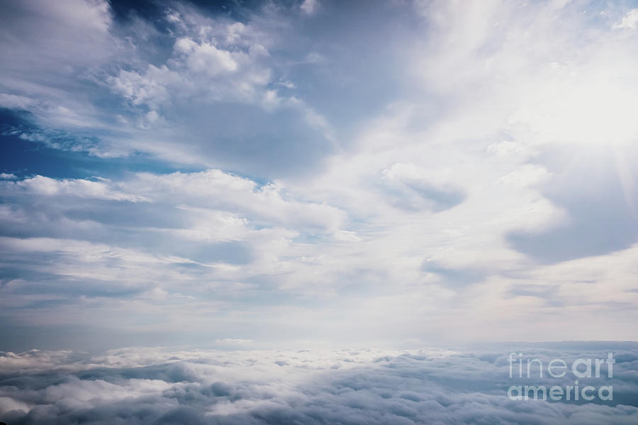 Scene of a winter cloudy sky from the top of a mountain peak. #2 Photograph by Joaquin Corbalan