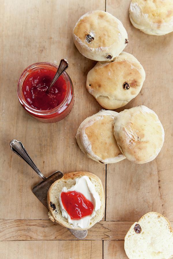 Scones With Clotted Cream And Strawberry Jam england #1 Photograph by Claudia Timmann
