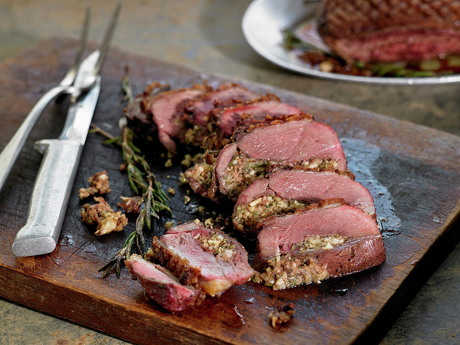 Seared Duck Breasts Stuffed With Garlic, Rosemary, Fennel And Parmesan Cheese #1 Photograph by Michael Kraus