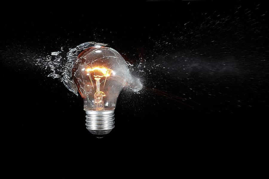 Shattering Light Bulb #1 Photograph by Photography Nimmervoll