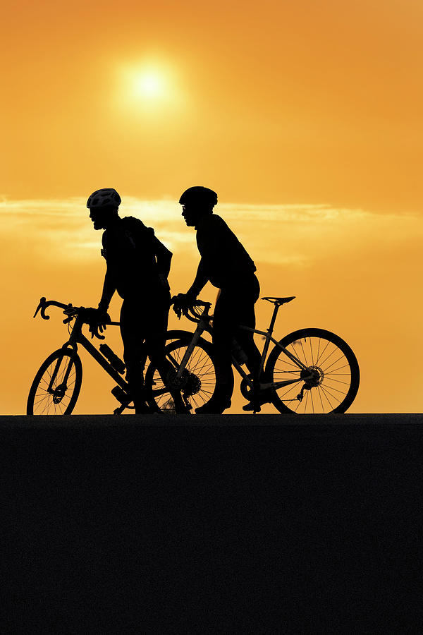 Silhouette Of 2 Bicycle Riders #1 Digital Art by Laura Diez