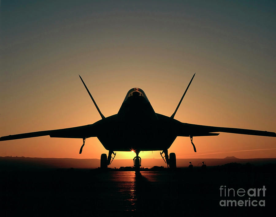 Silhouette Of A F-22 Raptor #1 Photograph by Stocktrek Images