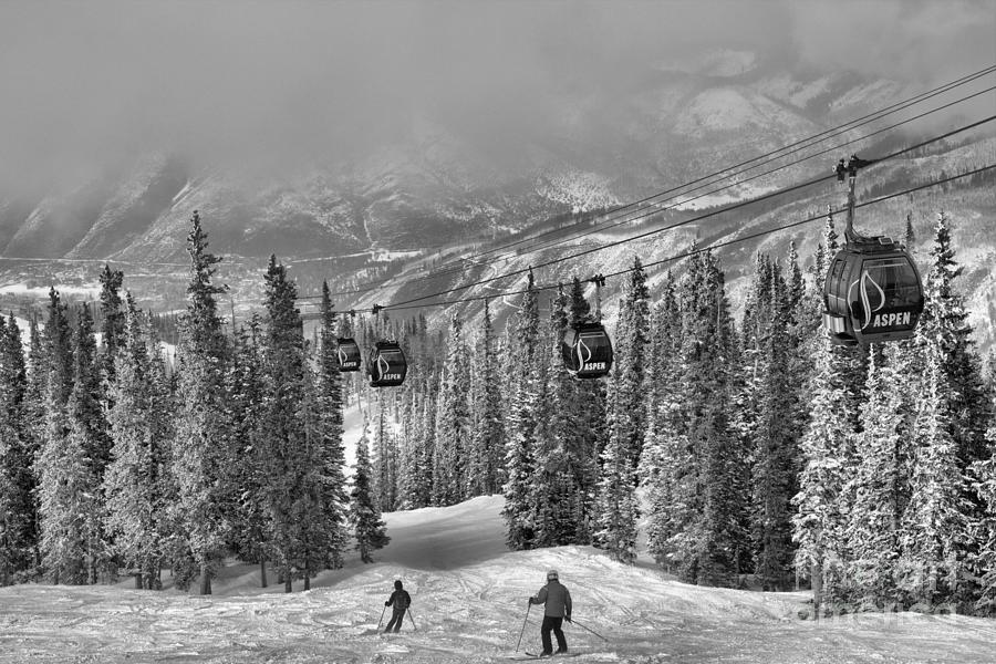 Skiers Under The Aspen Gondola #1 Photograph by Adam Jewell