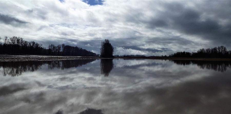 Clouds And Water Photograph by Linda Vanoudenhaegen