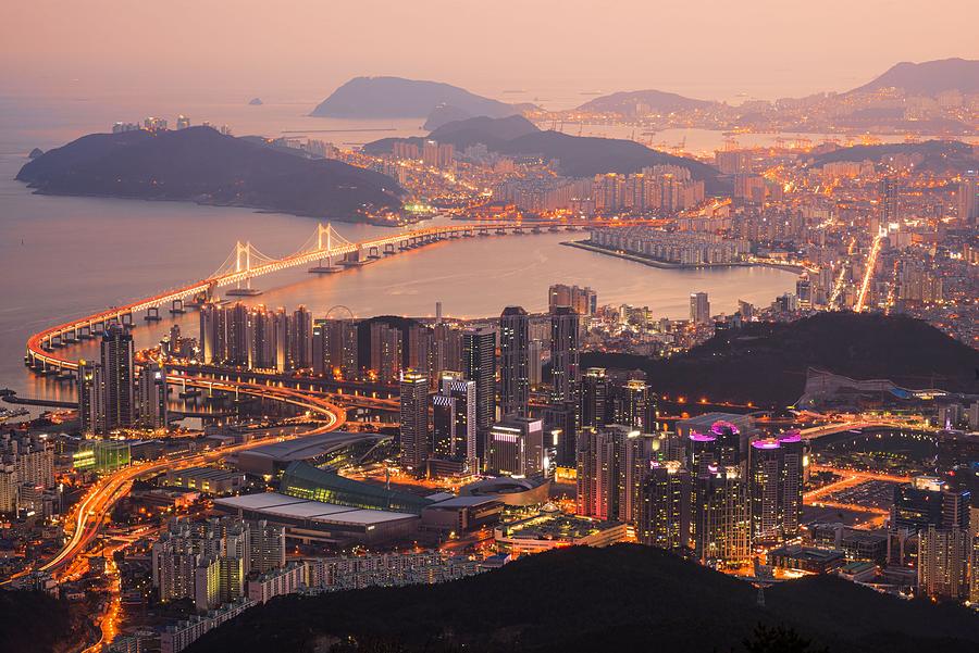 Sunset Photograph - Skyline Of Busan, South Korea #1 by Sean Pavone