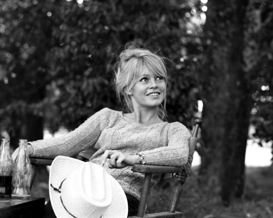 Smiling Brigitte Bardot Sitting On Chair Photograph by Globe Photos ...