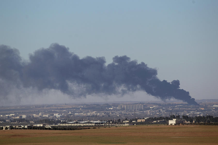 Smoke Rises from the Northern Syrian Photograph by Khalil Ashawi - Fine ...