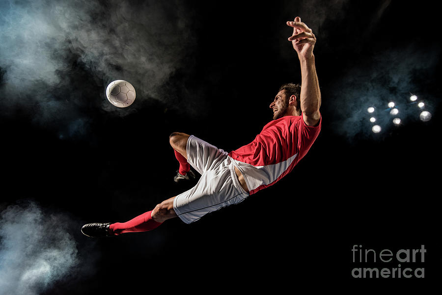Soccer Player Kicking Photograph by Simonkr
