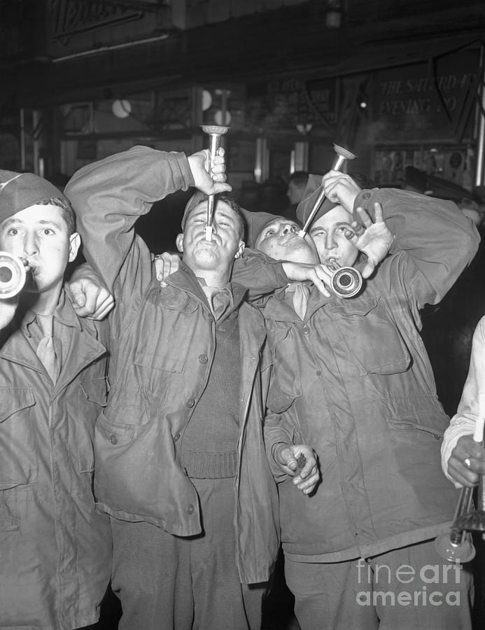 Soldiers Blowing Horns #1 Photograph by Bettmann