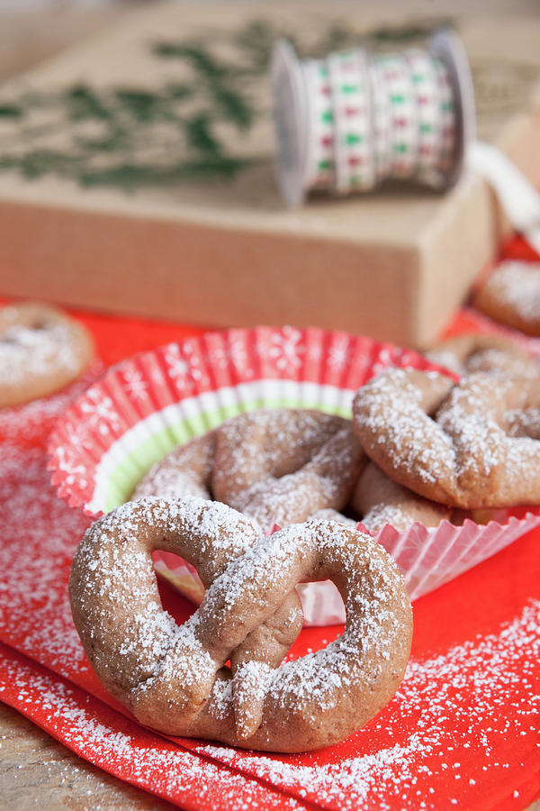 Spiced Pretzels Dusted With Icing Sugar #1 Photograph by Jalag / Intosite Kitchengirls