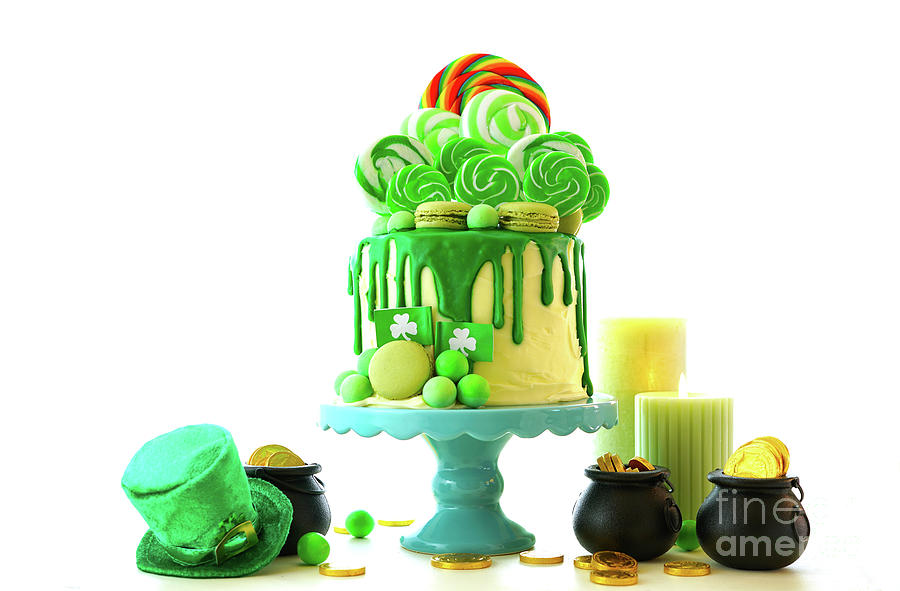 St Patricks Day theme lollipop candy land drip cake. #1 Photograph by Milleflore Images