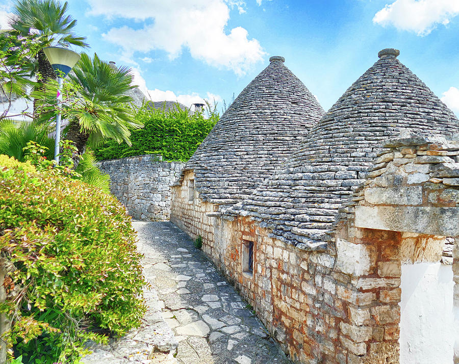 Stone coned rooves of trulli houses #1 Photograph by Steve Estvanik