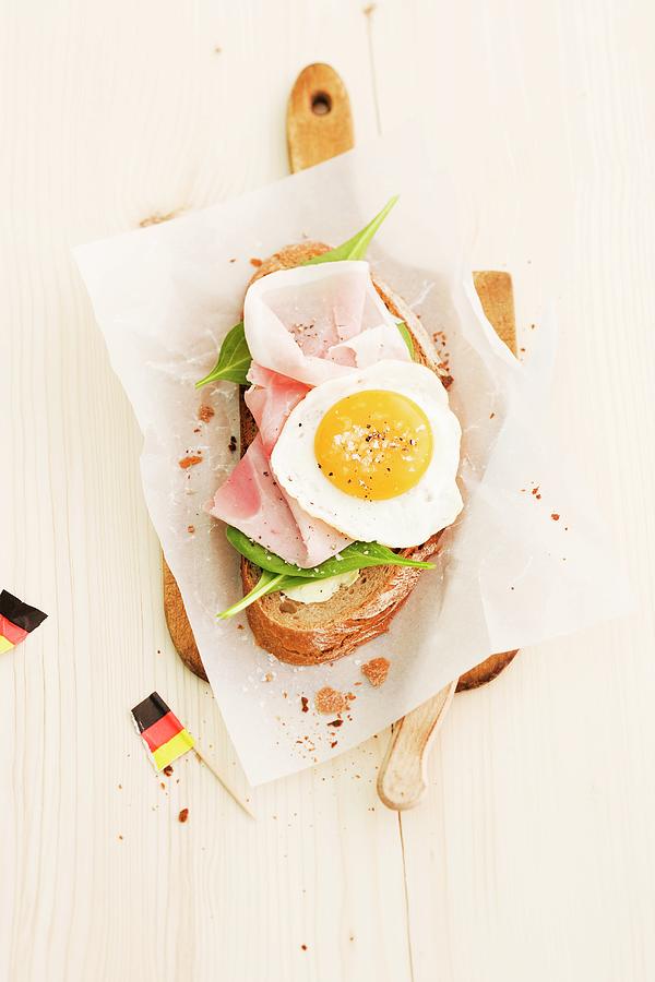 Strammer Max bread Topped With Ham And A Fried Egg #1 Photograph by Michael Wissing
