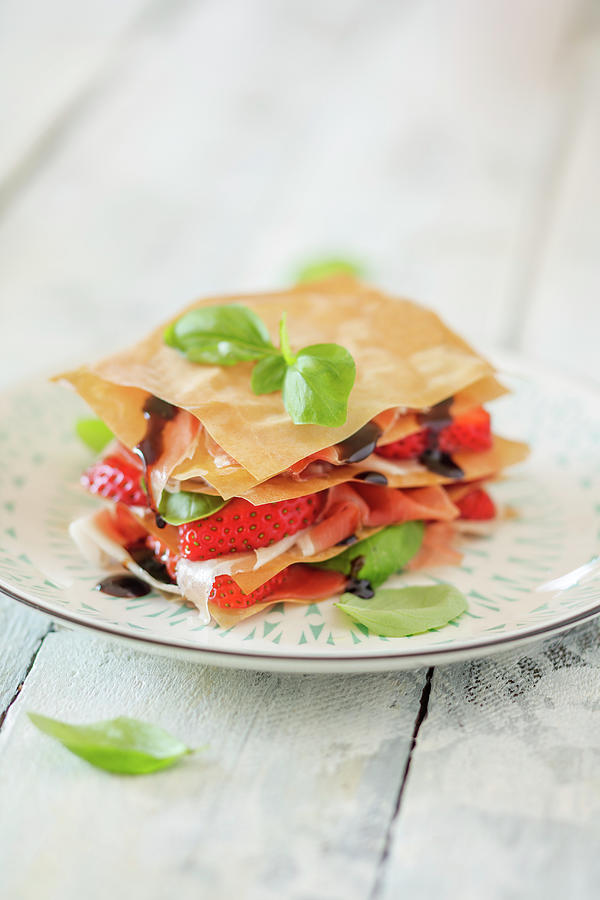 Strawberry And Serrano Ham Lasagne With Filo Pastry And Balsamic Cream #1 Photograph by Jan Wischnewski
