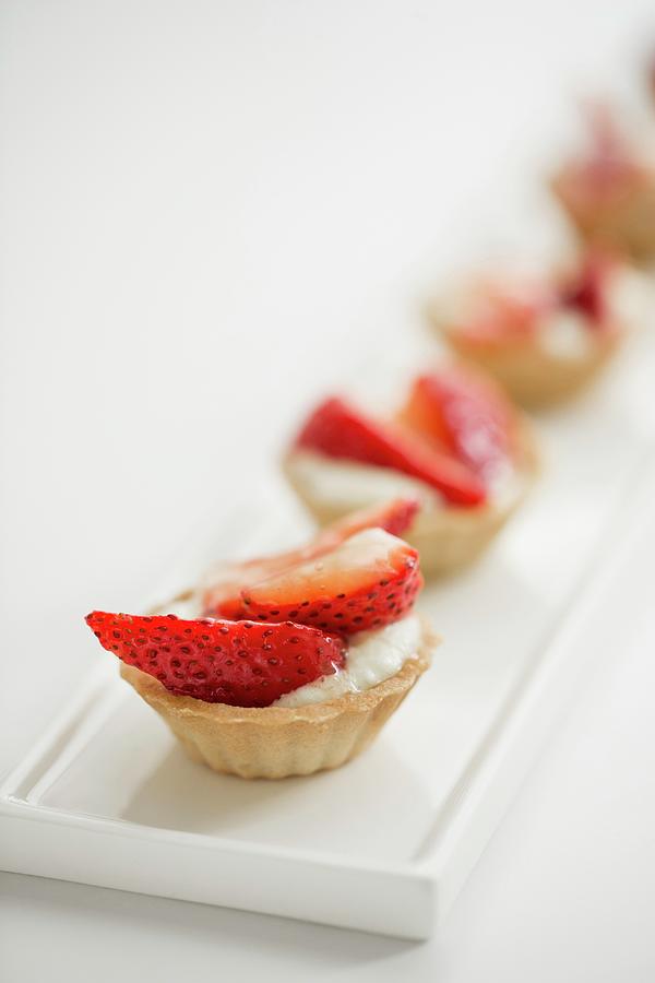 Strawberry Tartlets #1 Photograph by Julia Cawley
