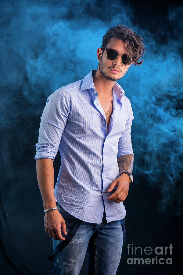 Stylish handsome young man in studio shot #1 by Stefano C