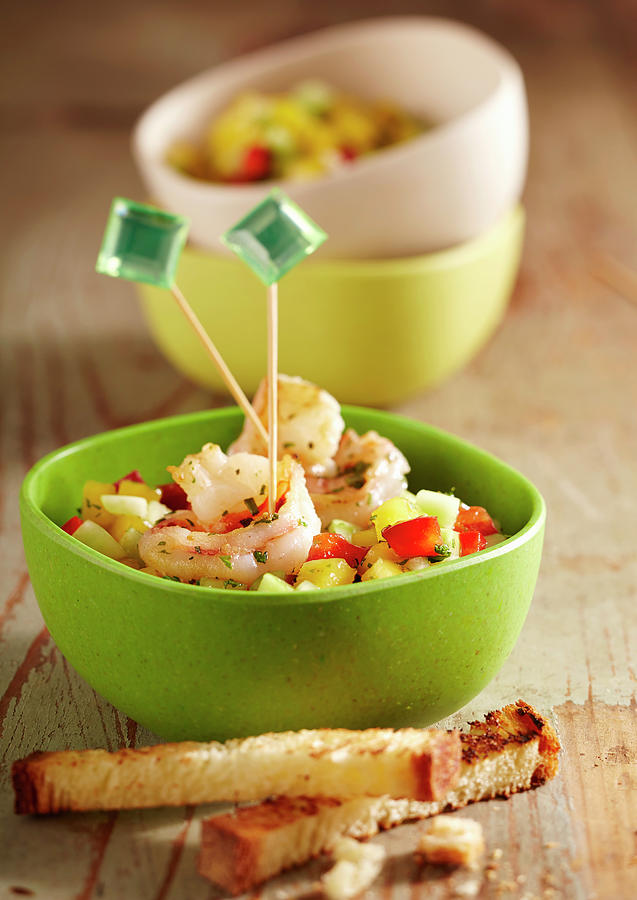 Summer Party Snack: Mango And Cucumber Salad With Fried Shrimps And Toasted Bread #1 Photograph by Teubner Foodfoto