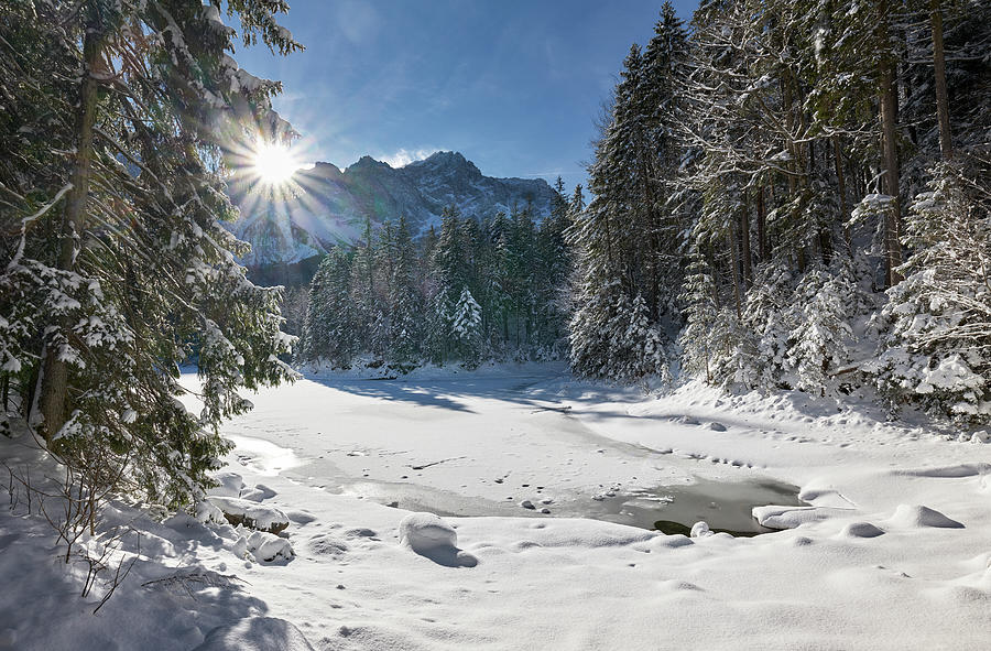 Sunrise At The Eibsee Below The Zugspitze, One Of The Most Beautiful Mountain Lakes In Bavaria, Bavaria, Germany #1 Photograph by Thomas Grundner