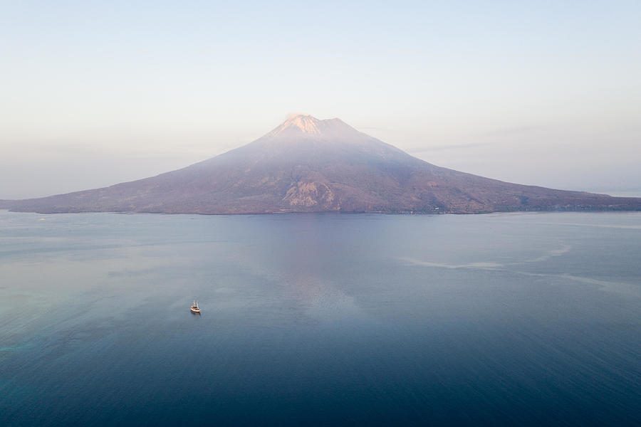 Nature Photograph - Sunrise Illuminates The Iliape Volcano #1 by Ethan Daniels