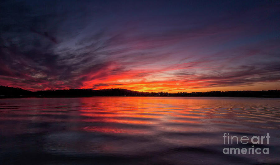 Sunrise on the lake #1 Photograph by Bernd Laeschke