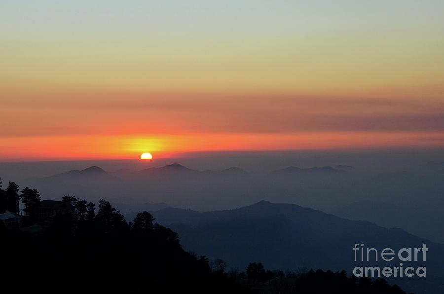 Sunset over mountains and trees of Murree Punjab Pakistan #1 Photograph by Imran Ahmed