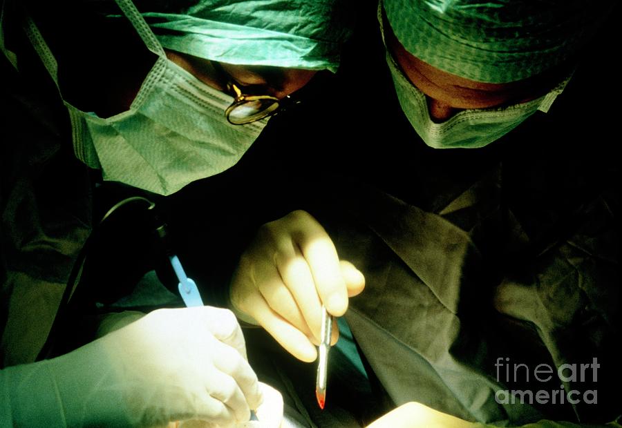 Surgeons Operating On A Cancerous Breast #1 Photograph by Mauro Fermariello/science Photo Library