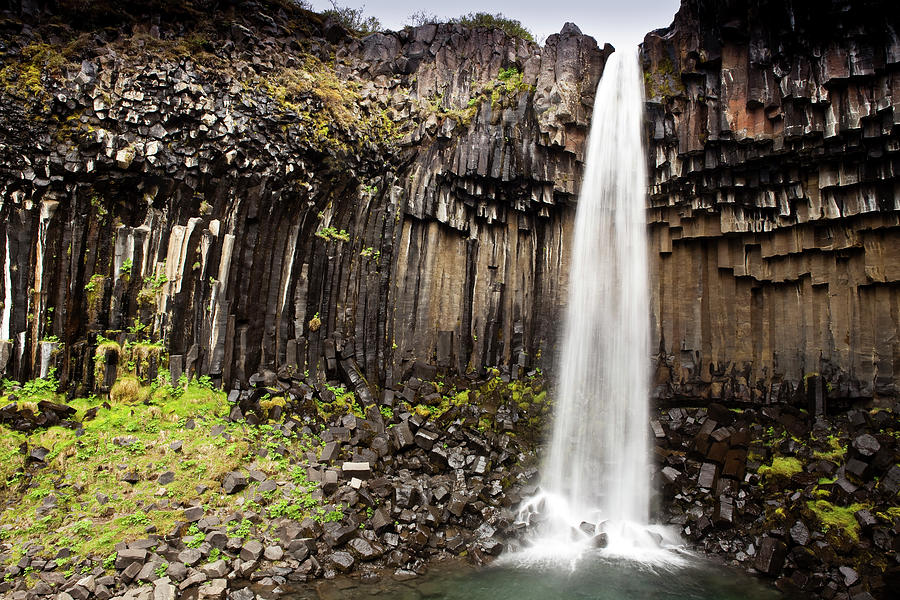 Svartifoss Waterfall Cascading Over #1 Photograph by Richard Ianson