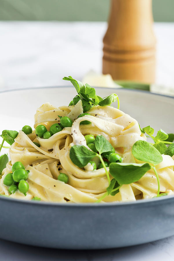 Tagliatelle With Peas And A Creamy Sauce #1 Photograph by Russel Brown