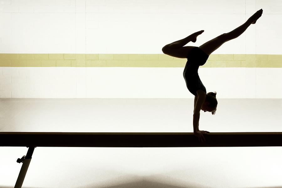 Teenage Gymnast 16-18 Performing On Photograph by Romilly Lockyer