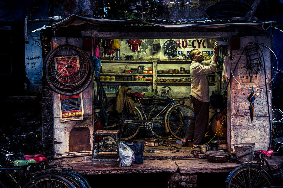 The Bike Repairman #1 Photograph by Marco Tagliarino