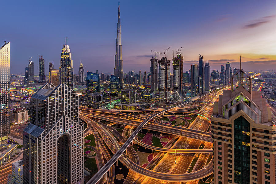 The Illuminated City With The Burj Khalifa In Dubai, Uae Photograph by ...