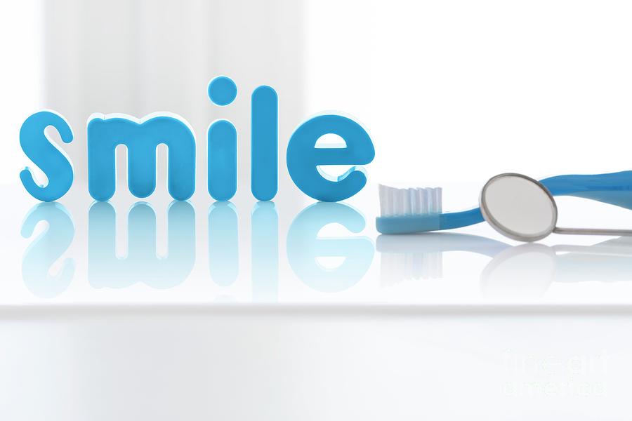 The Word smile In Blue Letters With Toothbrush #1 Photograph by Science Photo Library