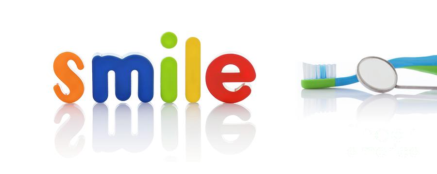 The Word smile In Multicoloured Letters With Toothbrush #1 Photograph by Science Photo Library