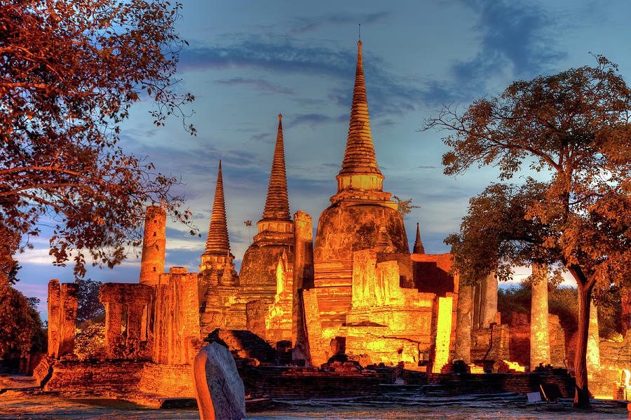 Three Illuminated Pagodas At Wat Phra #1 Photograph by Fototrav